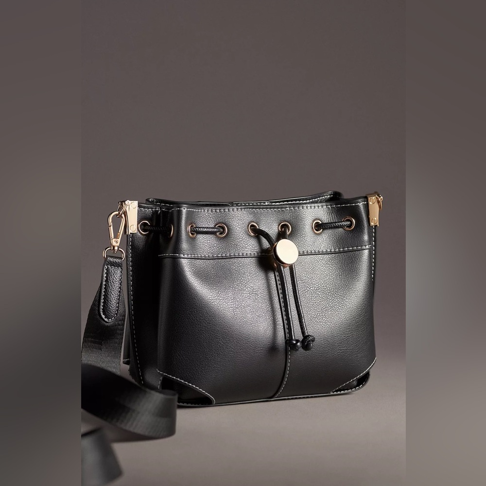Anthropologie MINI WHIPSTITCH BUCKET BAG
Style No. 98057243 Color: Black